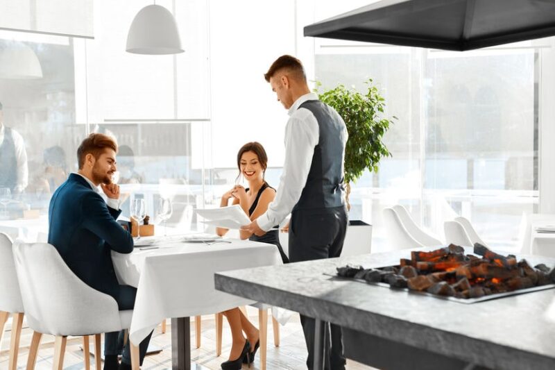 Romantic Dinner. Happy Couple In Love Ordering Food In Restauran_vE Main banner of BioSure's article